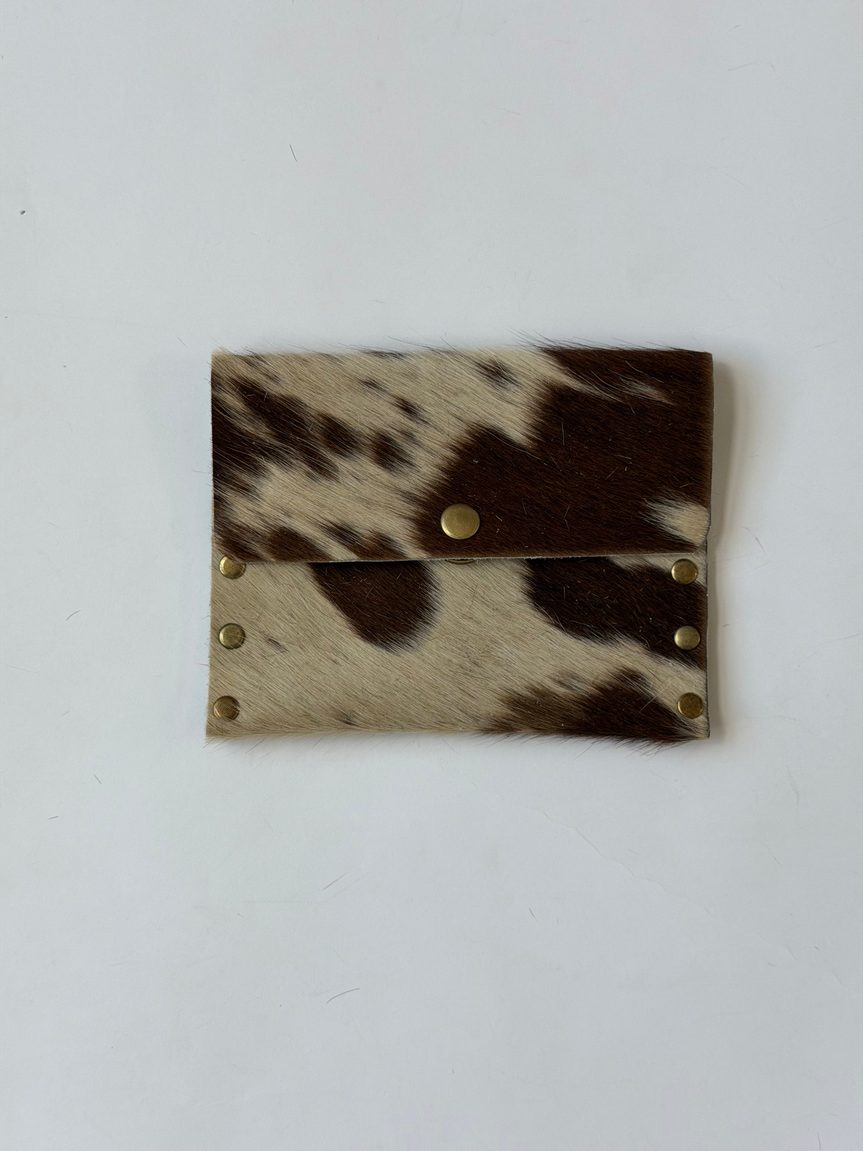 brown cowhide pouch