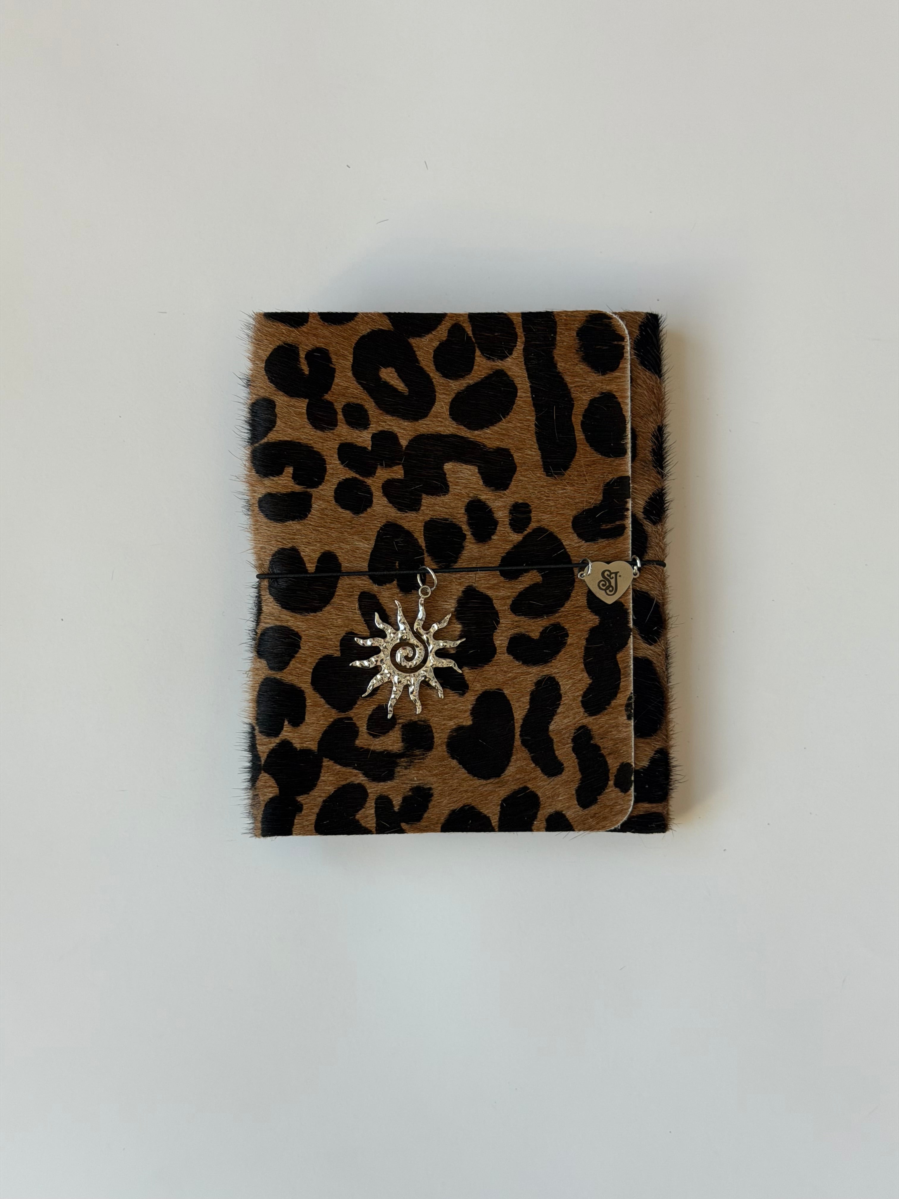 A6 leopard print w/ surprise charm