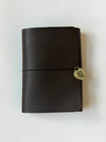 essential leather trifold ✶