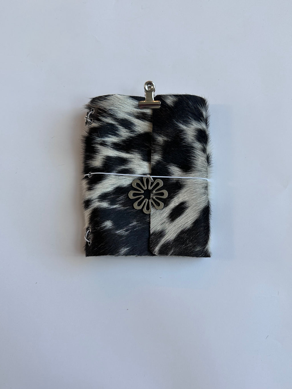 dark cowhide with surprise charm 🐮