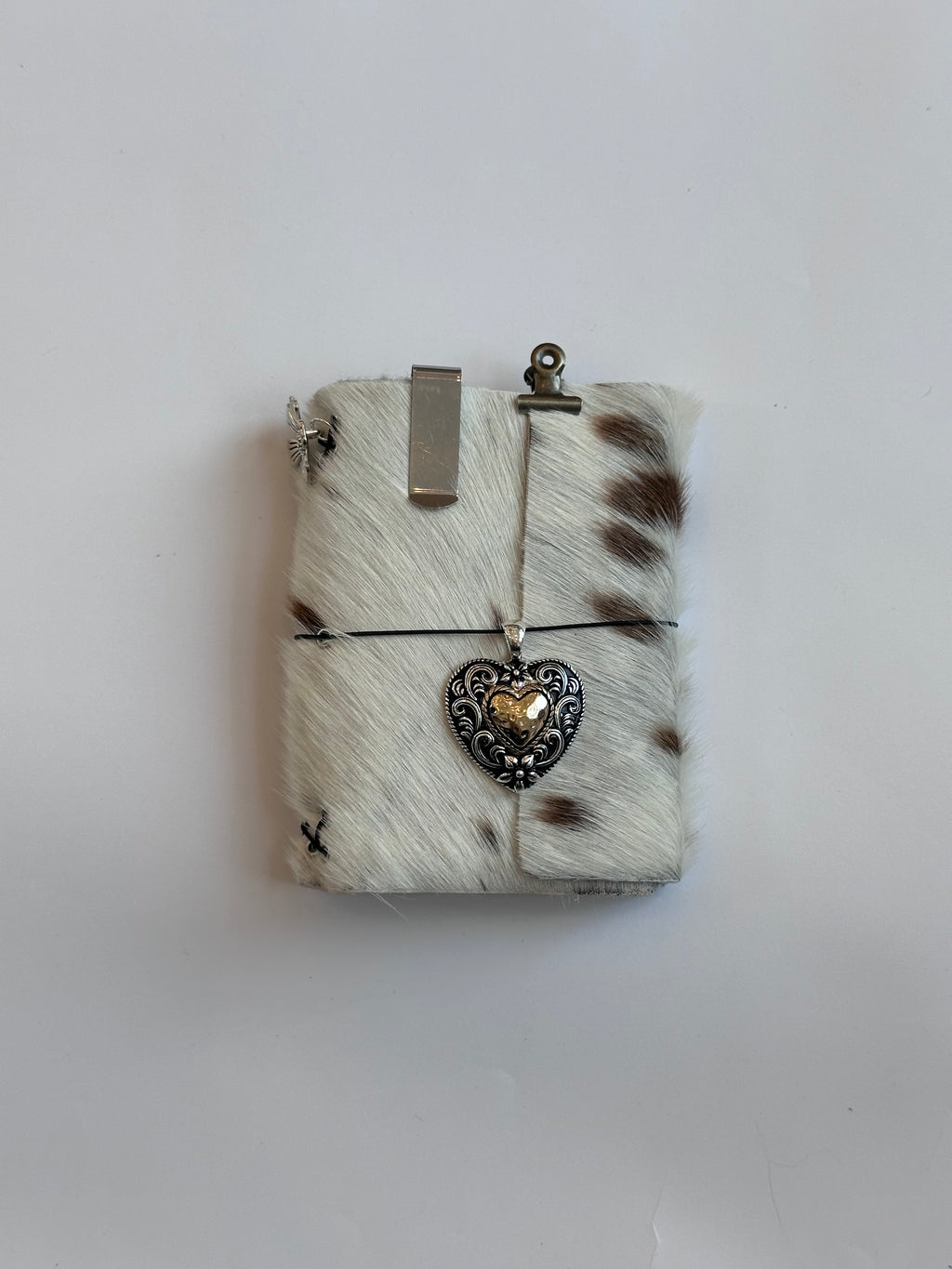 brown cowhide with surprise charm 🐮