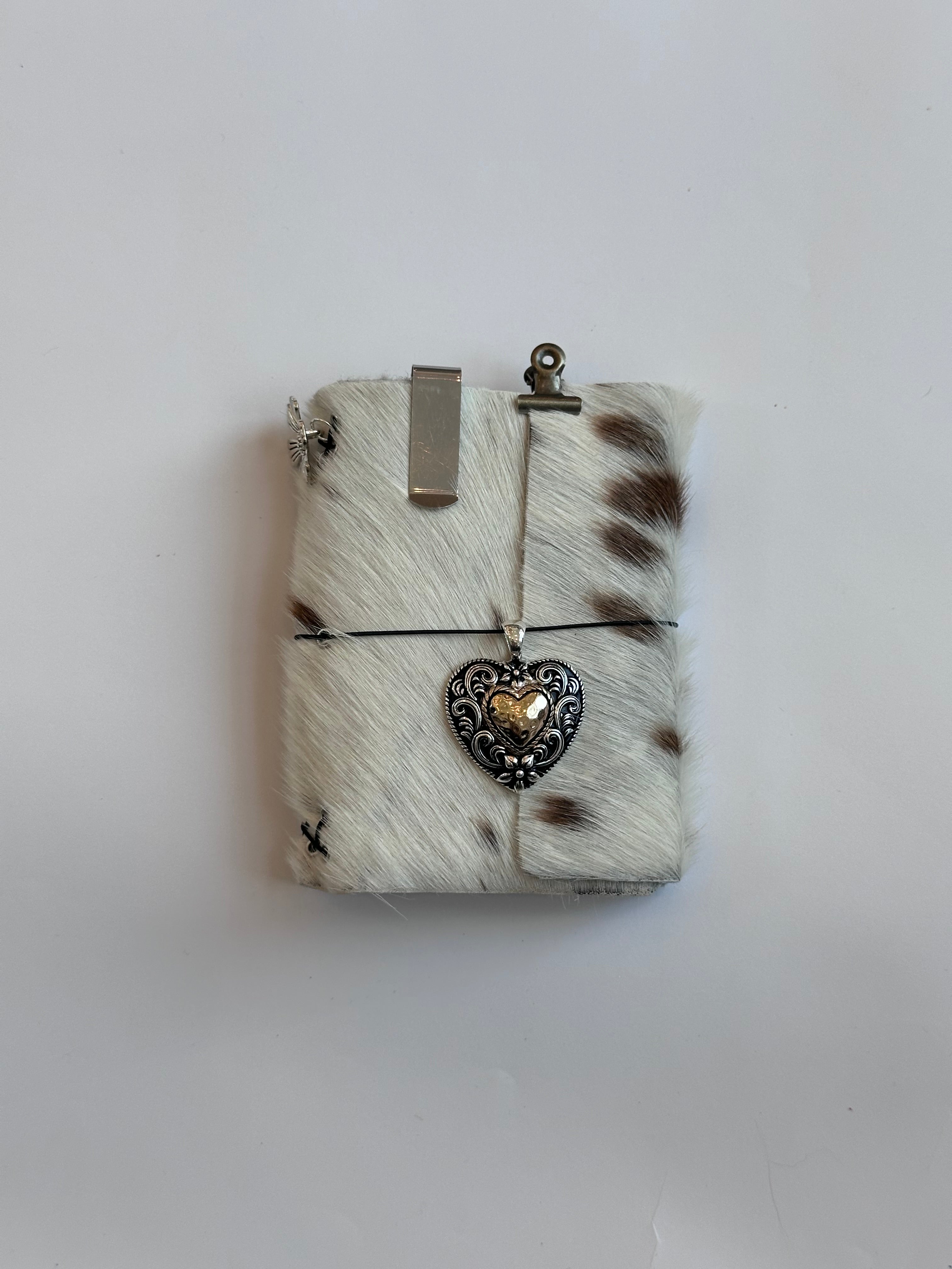 brown cowhide with surprise charm 🐮