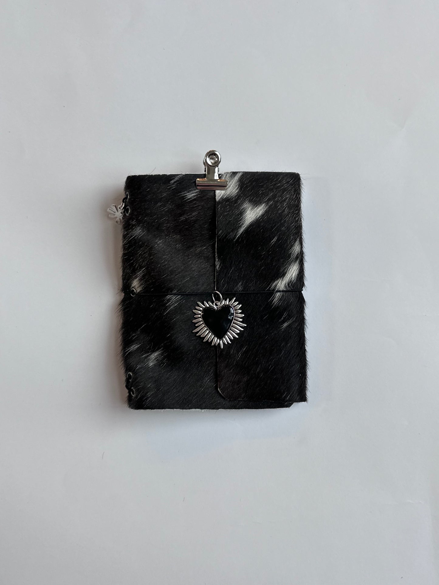dark cowhide with surprise charm 🐮