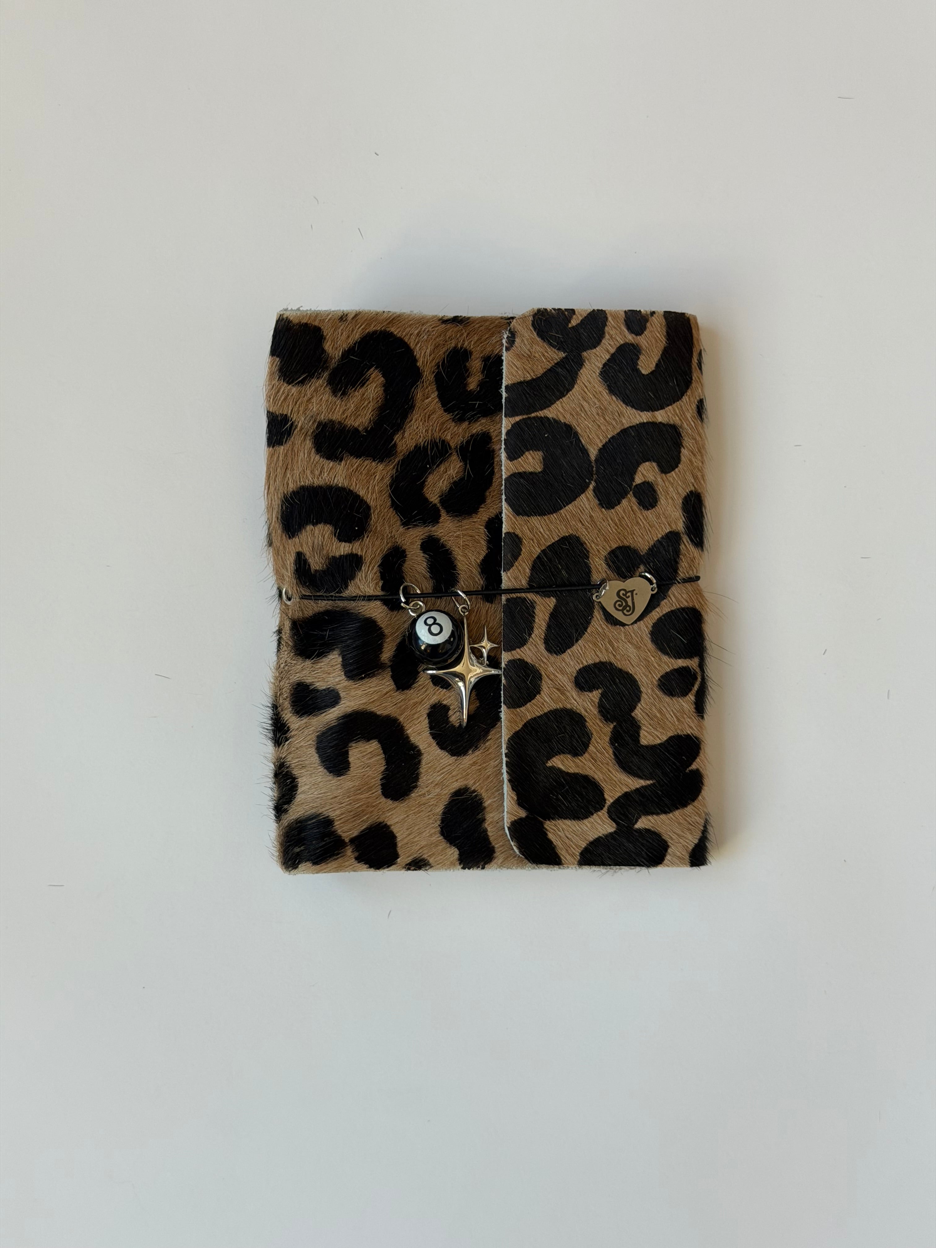 A6 leopard print w/ surprise charm