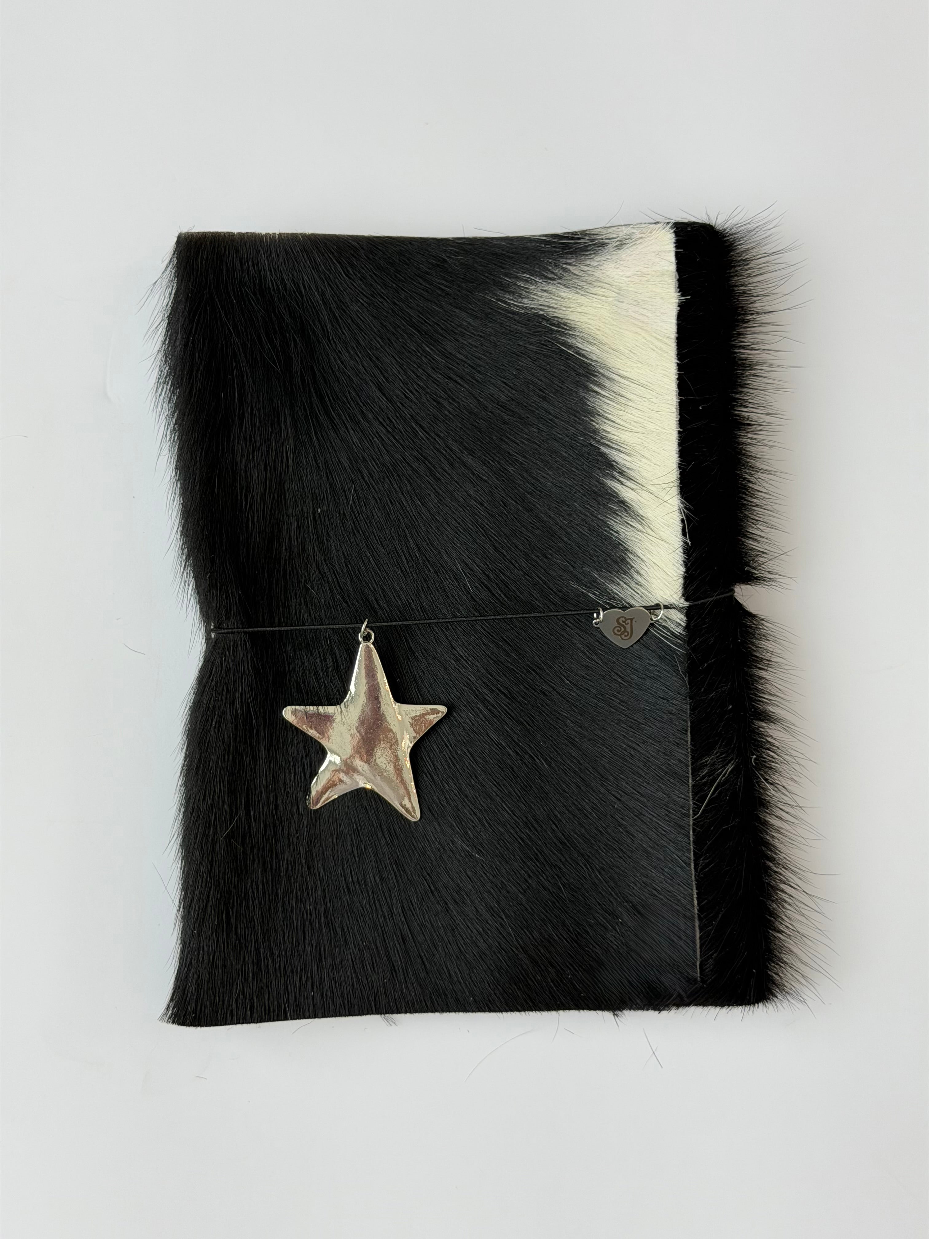 A5 dark cowhide w/ surprise charm 🐮