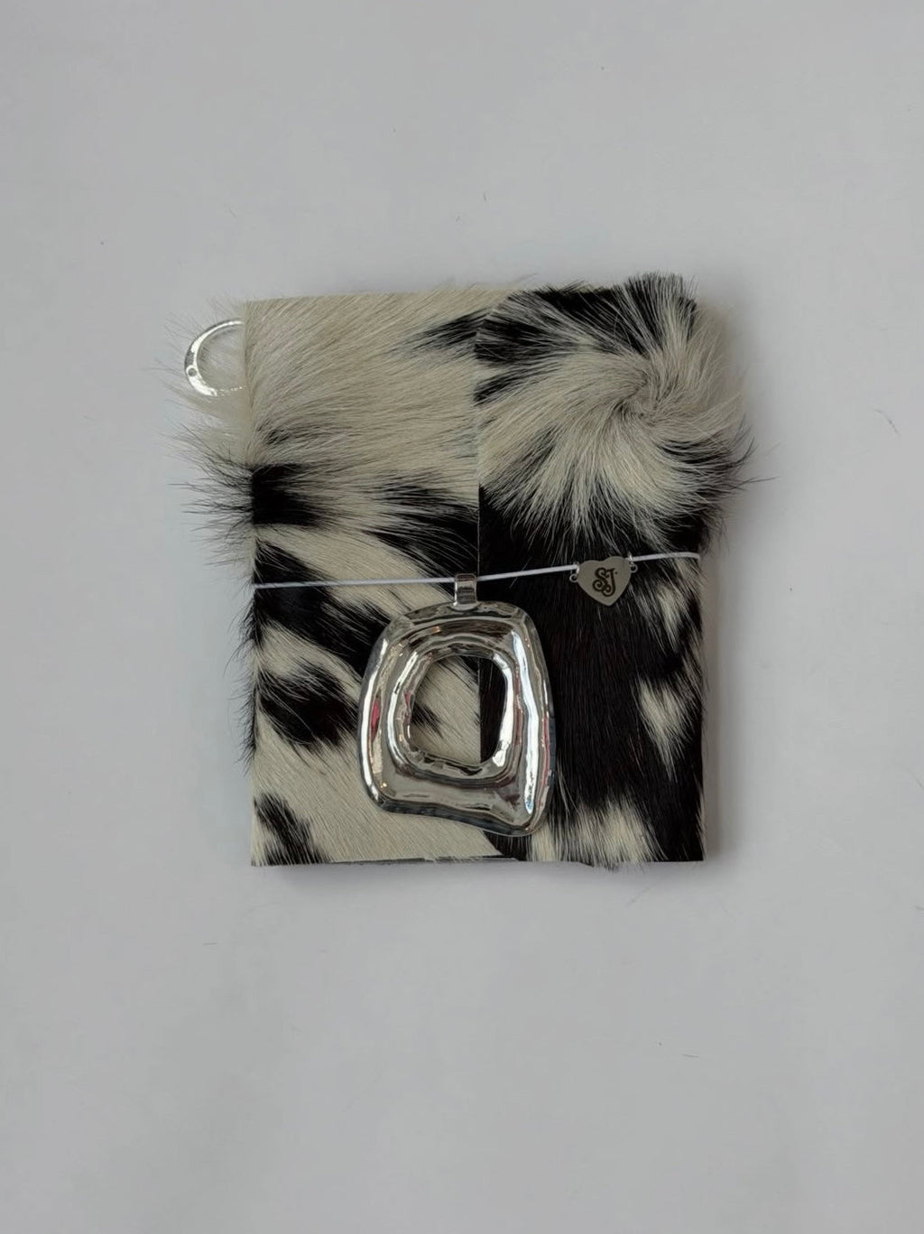 dark cowhide trifold 🐮