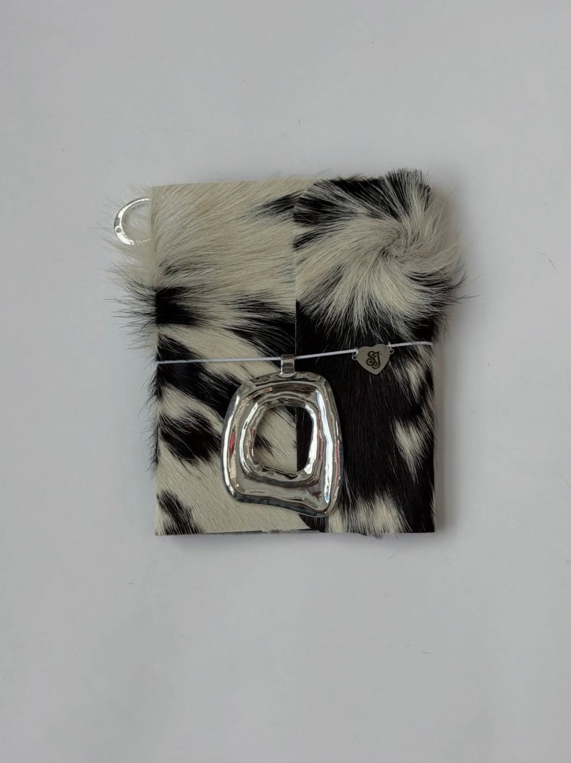 dark cowhide trifold 🐮