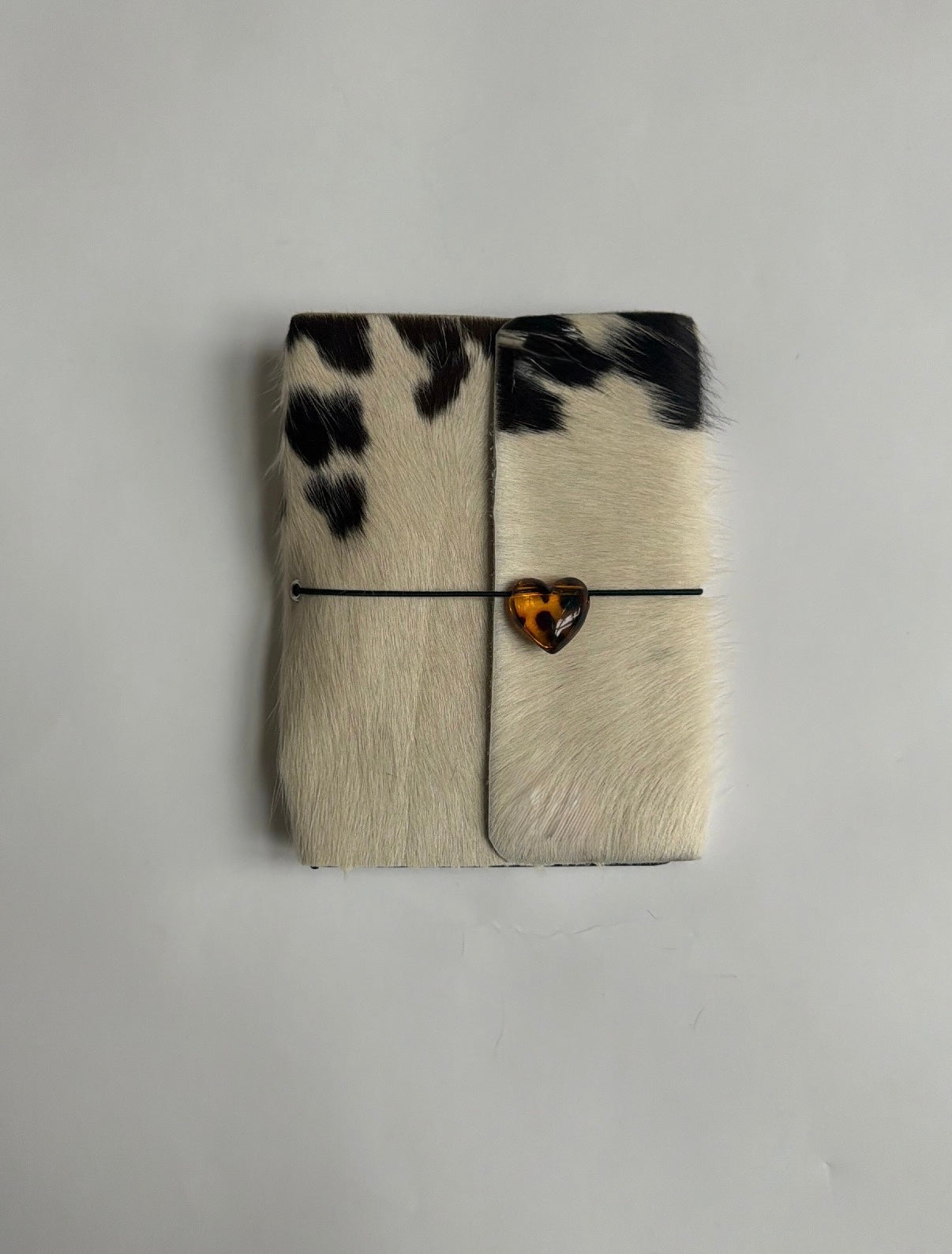 dark cowhide trifold 🐮