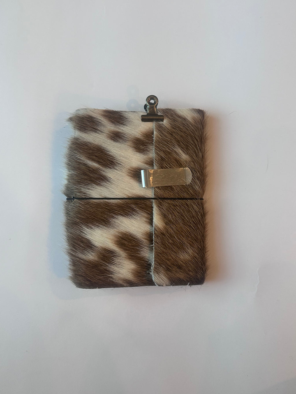 brown cowhide with surprise charm 🐮