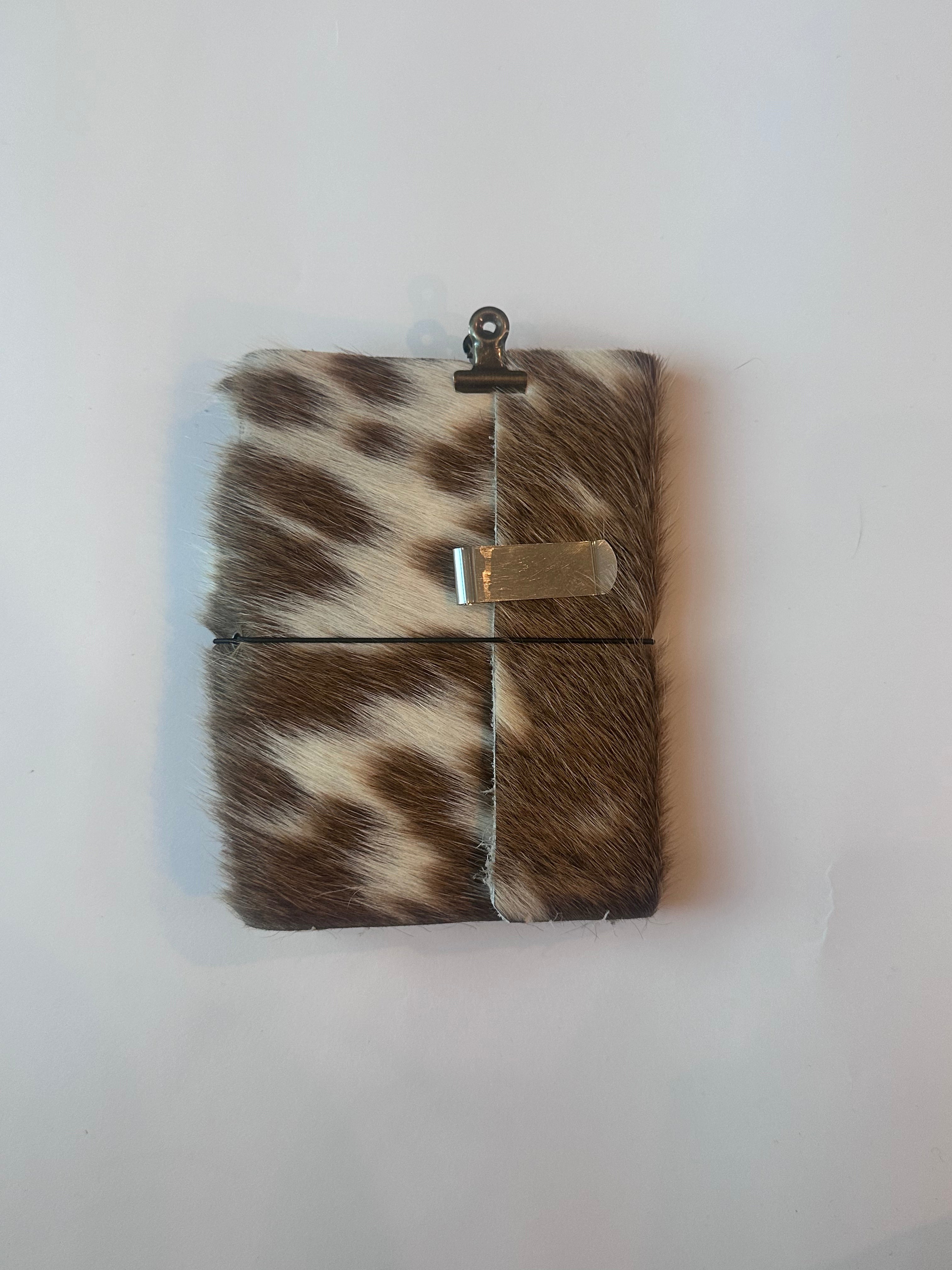 brown cowhide with surprise charm 🐮